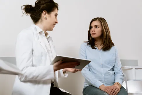 Female Consulting with Doctor (1)